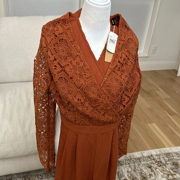 Brand new jumpsuit with lace top and wide leg bottom - Picture 2 of 5